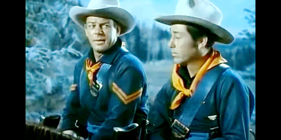William Ching as Cpl. Donlin and Wally Cassell as Trooper Muro, on patrol with Capt. Calhoun in Oh! Susanna (1951)