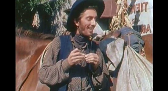 Aaron Spelling as Apache Joe gang member Catur, discovering Johnny Colt's hideout in Three Young Texans (1954)