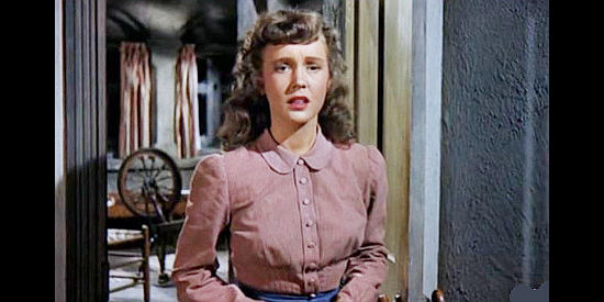 Allen Roberts as Ella Sue, Terry Canfield's wife, about to deliver distressing news in Sante Fe (1951)