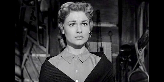 Ann Robinson as Rose Fargo, untrusting of Jubal's alleged change of heart in Gun Brothers (1956)