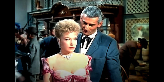 Anne Baxter as Cherry Malotte, giving lover Roy Glennister (Jeff Chandler) the cold shoulder in The Spoilers (1956)