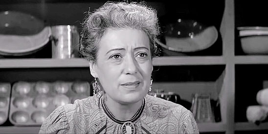Argentina Brunetti as Mrs. Bonaventura, a shop keeper with a romantic streak in Showdown at Boot Hill (1958)