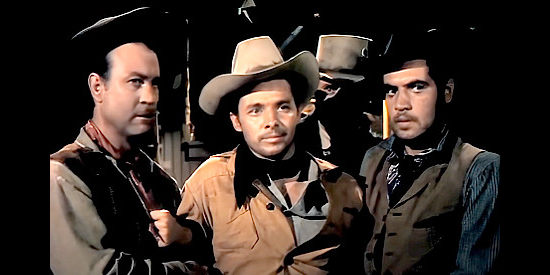 Audie Muprhy as Reb Kittiridge, faced with a tight spot thanks to Telford's henchmen in Gunsmoke (1953)
