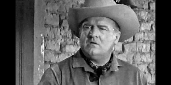 Barry Kelley as Sheriff Harris, beginning to believe the Mexican who hitched a ride on the stage might have been involved in the attempted holdup in Gunfire at Indian Gap (1957)
