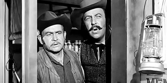 Barton MacLane as Lem Gotch and Robert Foulk as Tom Simmons, suspecting Sonny Grover is up to no good in Sierra Stranger (1957)