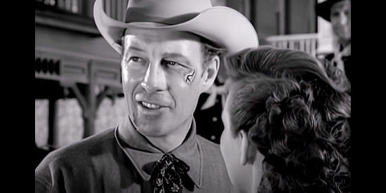 Bill Elliott as Steve McKay (aka John Baker, aka Ringo), showing the scars he got from fighting Proctor's men in The Savage Horde (1950)