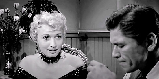 Carole Mathews as Jill Crane, talking about the daughter who has disowned her in Showdown at Boot Hill (1958)