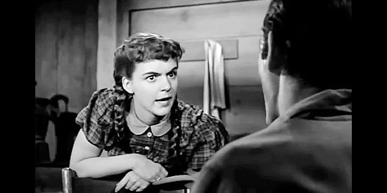 Carolyn Craig as the young farm girl Velvet Clark befriends in Gunsight Ridge (1957)