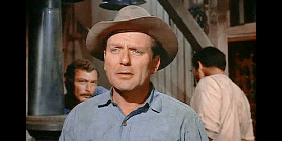 Charles McGraw as Cal Moore, leader of the effort to drill an oil well in Joe Dakota (1957)