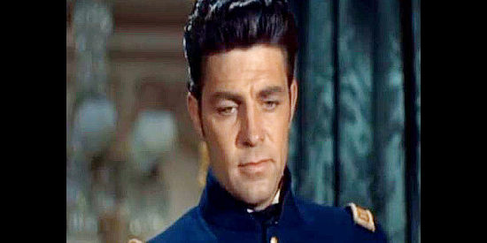 Dale Robertson as Capt. Vance Colby, realizing the father he came to visit is dead in The Gambler from Natchez (1954)