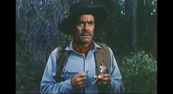 Dan Riss as Sheriff Dan Carter, trying to find $50,000 in stolen payroll money in Three Young Texans (1954)