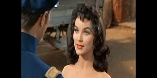 Debra Paget as Melanie Barbee, meeting Vance Colby after saving his 'beautiful head' from harm in The Gambler from Natchez (1954)