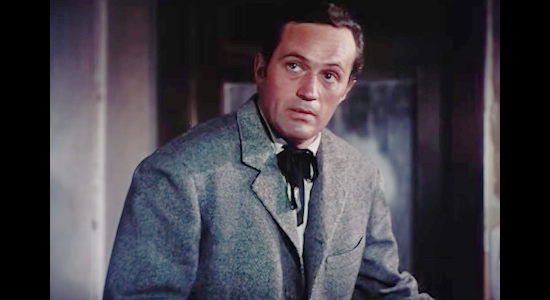 Don Haggerty as Sheriff Elmer Gall, getting a dire warning when a cigarette lands on his desk in The Sundowners (1950)