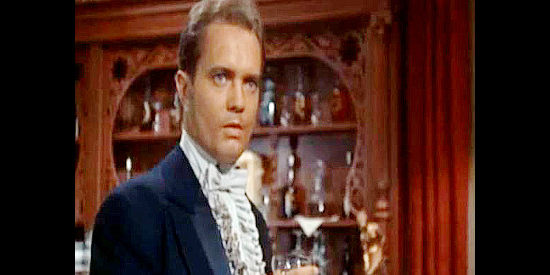 Douglas Dick as Claude St. Germaine, one of the men in on the death of Colby's father in The Gambler from Natchez (1954)