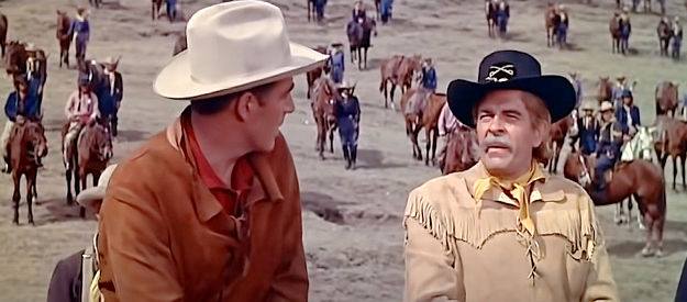 Douglas Kennedy as Col. Custer, discussing the upcoming battle with Charles Wentworh (Bill Hopper) in Sitting Bull (1954)
