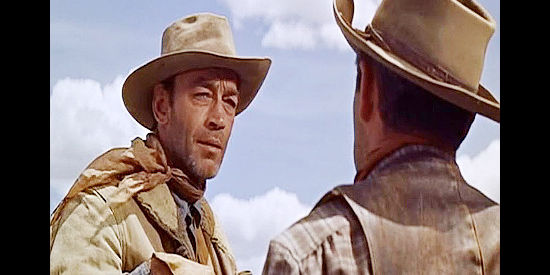 Douglas Spencer as Hemp Scribner, trying to explain how Tony returned from a cattle drive with a saloon girl in Saddle the Wind (1958)