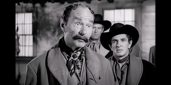 Earle Hodgins as Buck Yallop, the gunsmith who decides Gunlock might offer a lucrative business in The Savage Horde (1950)