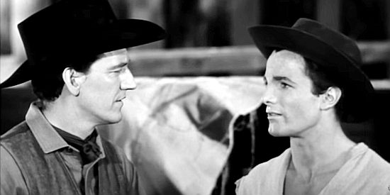 Earle Lyon as Sheriff Gregg Leech with Bainy (Steve Bowland), the one townsman willing to lend a hand in The Silver Star (1955)