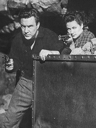 Edmund O'Brien as Larkin Moffatt and Yvonne DeCarlo as Candace Surrency in Silver City (1951)