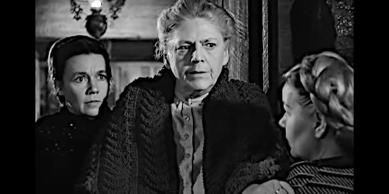 Ethel Barrymore as Granny, addressing the men who show up in the settlement while Rachel (Ann Dvorak) looks on in The Secret of Convict Lake (1951)