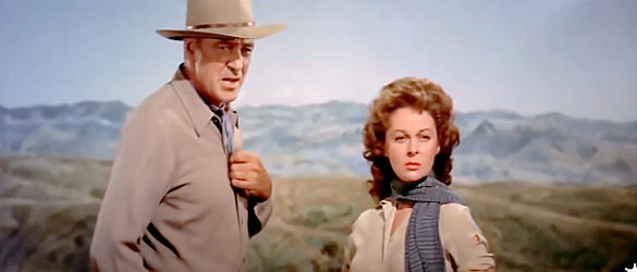 Gary Cooper as Hooker and Susan Hayward as Leah Fuller consider another rescue in Garden of Evil (1954)