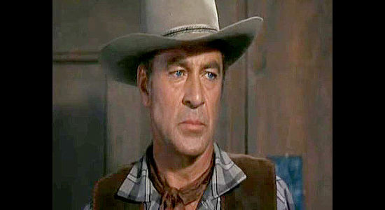 Gary Cooper as Lex Kearney, in civilian clothes after being branded a coward and stripped of his duty in Springfield Rifle (1952)