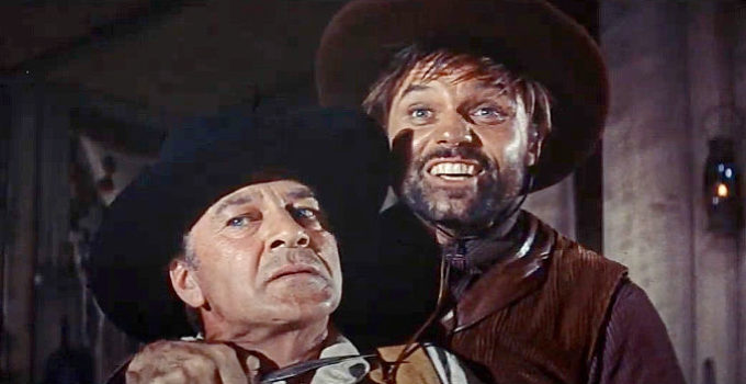 Gary Cooper as Link Jones under the knife of Coaley (Jack Lord) in Man of the West (1958)