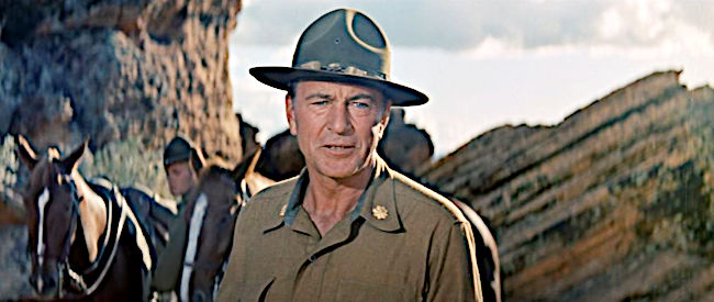 Gary Cooper as Maj. Thomas Thorn, trying to keep his Medal of Honor nominees alive until they can receive the award in They Came to Cordura (1959)