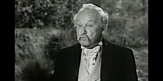 George Cleveland as Col. Atterby, a father well aware of his daughter's manipulating ways in San Antone (1953)