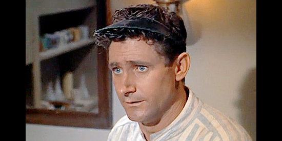 George Dunn as Jim Baldwin as the barber with a conscience in Joe Dakota (1957)
