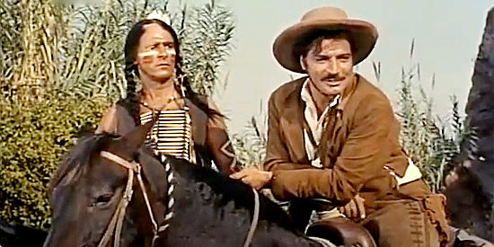 George Keymas as Chief Satank and Anthony Caruso as Chavez, plotting to ambush a wagon train in Sante Fe Passage (1955)