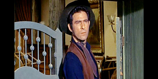 George Keymas as Honda, one of cattle king Ben Bodeen's hired guns in Gunsmoke in Tucson (1958)