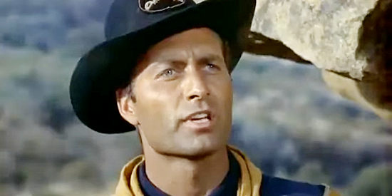 George Montgomery as Lt. Cam Elliott, trying to stop Black Cat and rescue a pretty gal in Seminole Uprising (1955)