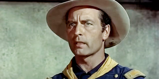 George Montgomery as Lt. Sam Elliott, Black Cat's adopted brother, out to stop his sibling in Seminole Uprising (1955)