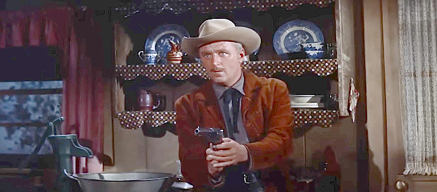 George N. Neise as Mort Harper, cornered and ready to gun his way out in The Tall Stranger (1957)