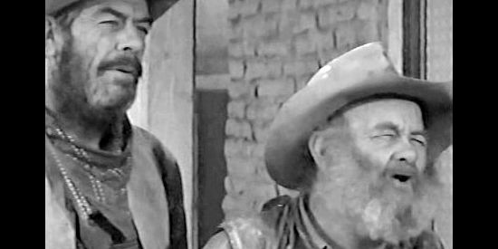 Glenn Strange as shotgun guard Matt and Chubby Johnson as stage driver Sam describe the attempted holdup to the sheriff in Gunfire at Indian Gap (1957)