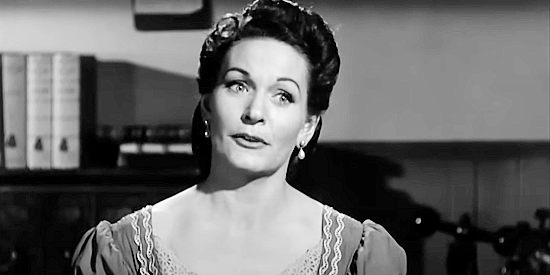 Gloria McGehee as Meg Anderson, a woman in love with Sonny Grover but wondering if he'll ever be ready to settle down in Sierra Stranger (1957)