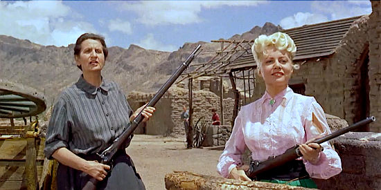 Hope Emerson as Hannah Lacey and Peggy Maley as Lucy Conover, ready for an attack in The Guns of Fort Petticoat (1957)