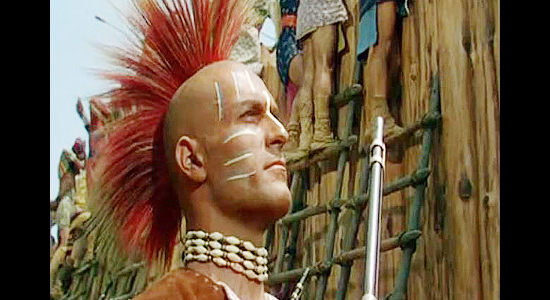 Hugh O'Brian as Kajek, the war-mongering chief of the Seminole, having surround Fort King in Seminole (1953)