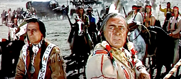 Iron Eyes Cody as Crazy Horse and J. Carrol Naish as Sitting Bull, watching the cavalry approach in Sitting Bull (1954)