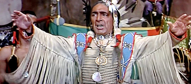 J. Carrol Naish as Sitting Bull, warning of an upcoming conflict with the whites in Sitting Bull (1954)