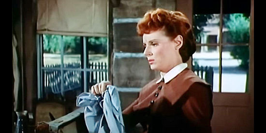 Jaclynne Greene as Paula Morrison, widow of the man killed by Tom Bannerman in Stranger on Horseback (1955)