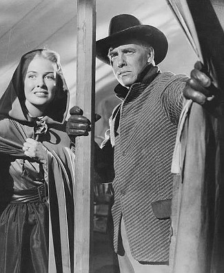Janis Carter as Judith Chandler and Warner Anderson as Dave Baxter in Sante Fe (1951)