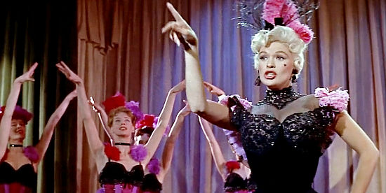 Jayne Mansfield as Kate, entertaining the boys in her saloon in The Sheriff of Fractured Jaw (1958)