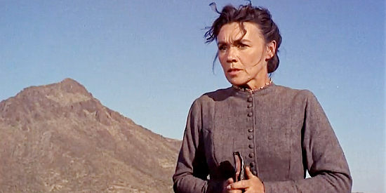 Jeanette Nolan as Cora Melavan, opposed to the use of violence in The Guns of Fort Petticoat (1957)