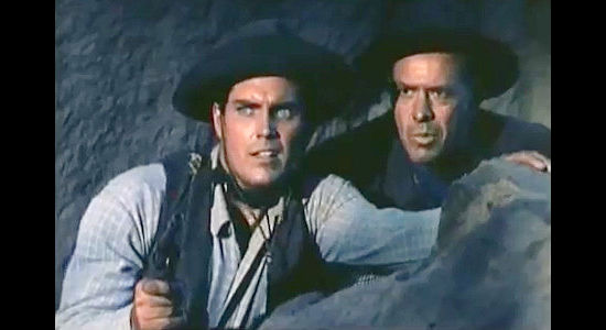 Jeffrey Hunter as Johnny Colt and Harvey Stephens as his father Jim, working together to clear their names in Three Young Texans (1954)
