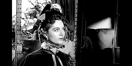 Joan Weldon as Molly Jones, the sheriff's daughter wondering about Matt Ryan's bravery in Gunsight Ridge (1957)