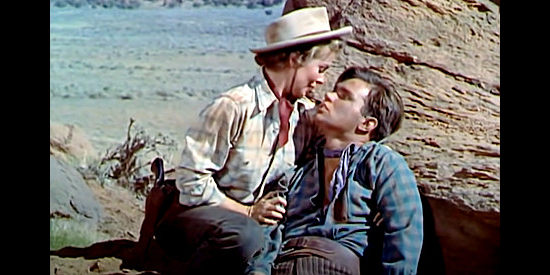 Joann Dru as Lilly with Jed (Darryl Hickman), her wounded brother, in Southwest Passage (1954)