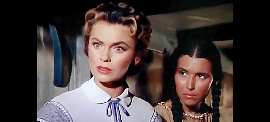 Joanne Dru as Nora Curtis and her Indian patient Lukoa (Pilar Del Rey) in the hands of a kidnapper in The Siege at Red River (1954