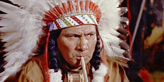 Joe Buffalo as Red Wolf, the Indian chief who 'adopts' Tibbs into the tribe in The Sheriff of Fractured Jaw (1958)